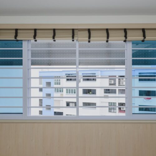 hdb white window grilles with rolled up blinds